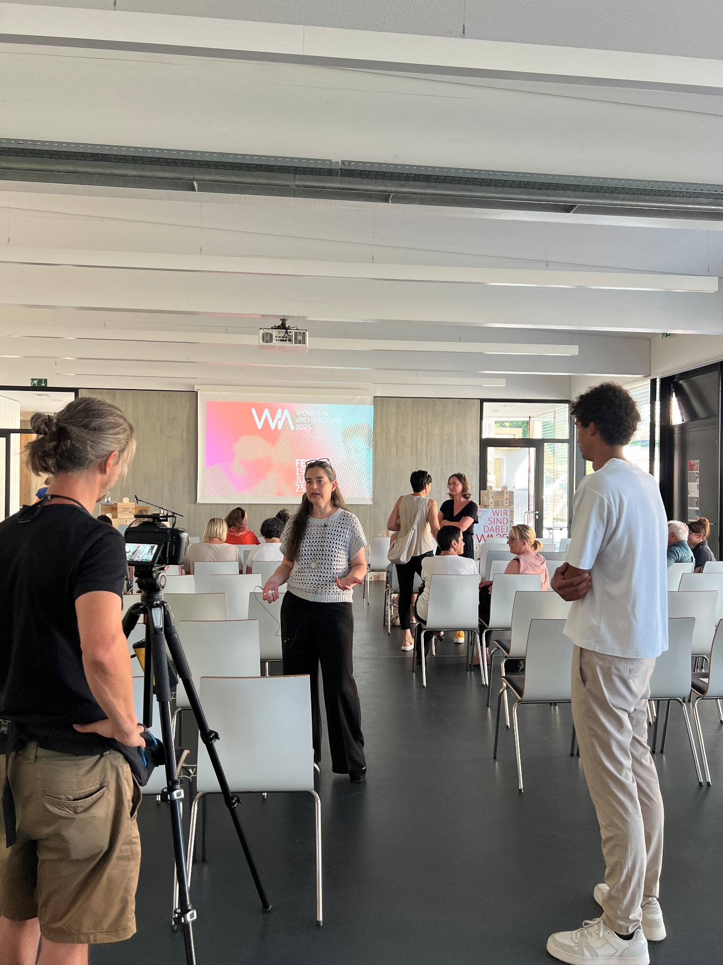 WIA Festival 2025 — Saal mit Projektion und Besuchern